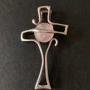 Sterling silver cross pendant with pink stone